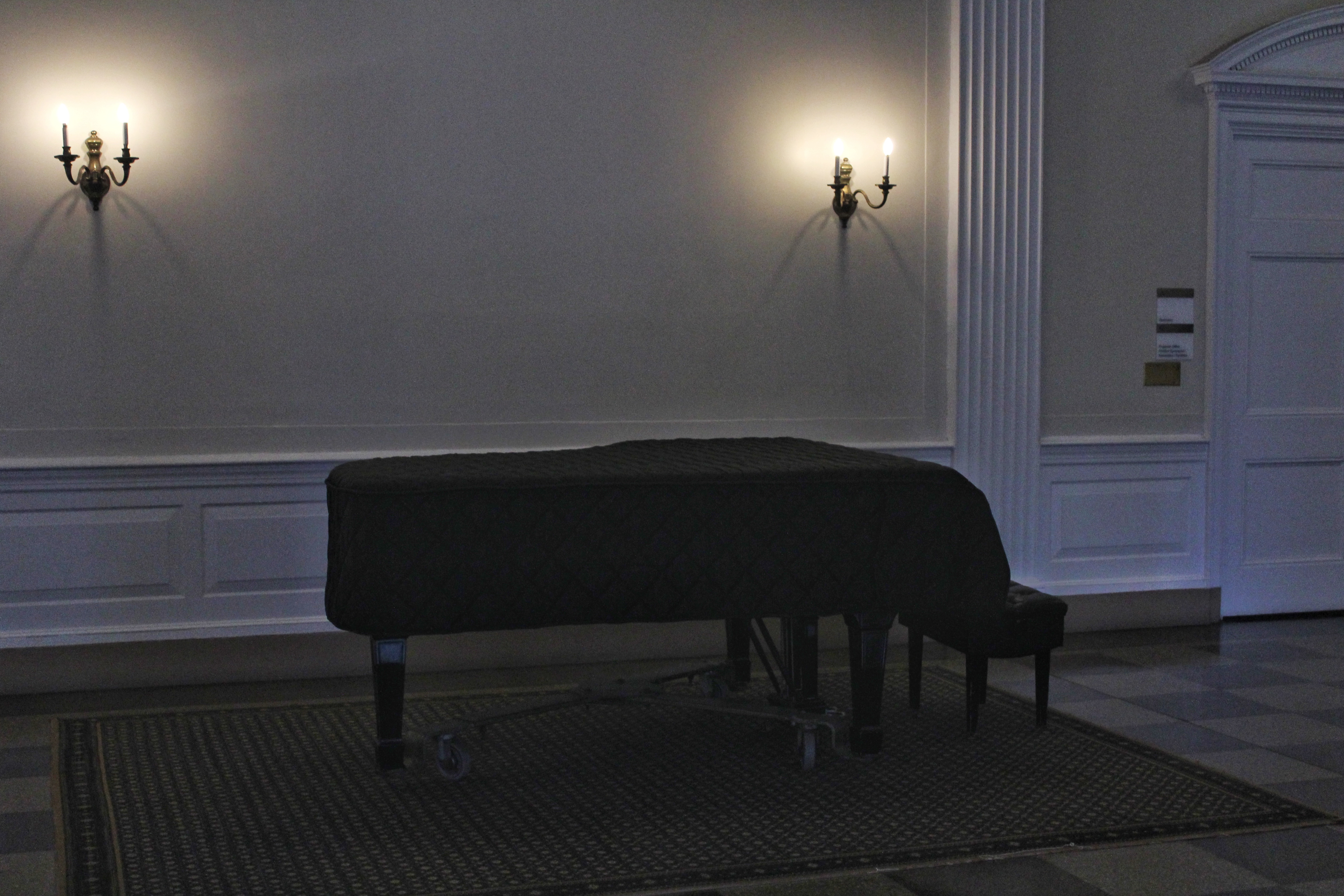 A piano on a rug.